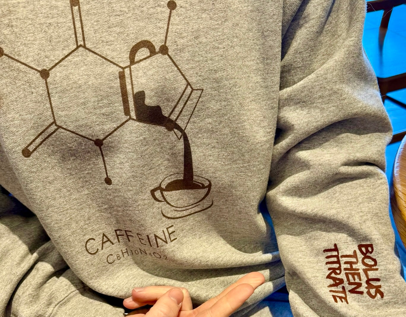 Dr. Beachgem holding Enerjava cup and wearing Enerjava long sleeve tee