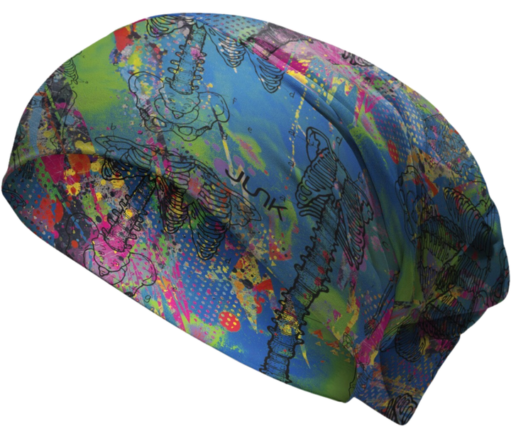 Colorful scrub cap with abstract designs on a white background