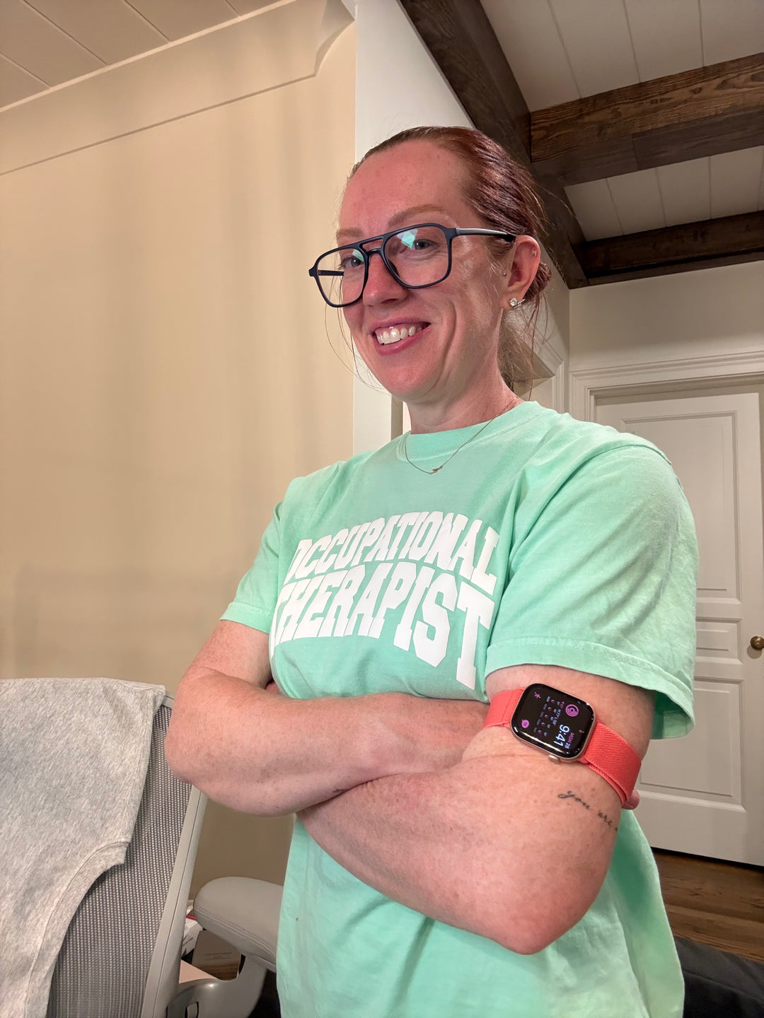 Ladyspinedoc wearing green Occupational Therapy tee