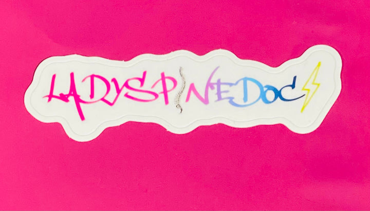 Colorful text 'LADYSPINEDOC' sticker on a pink background