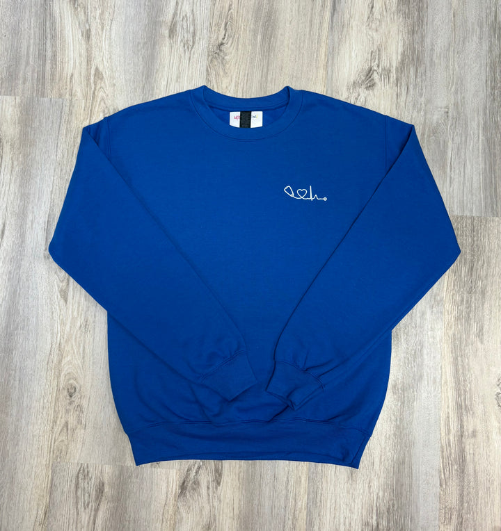Flat lay front of Royal Blue Heart of Medicine Sweatshirt